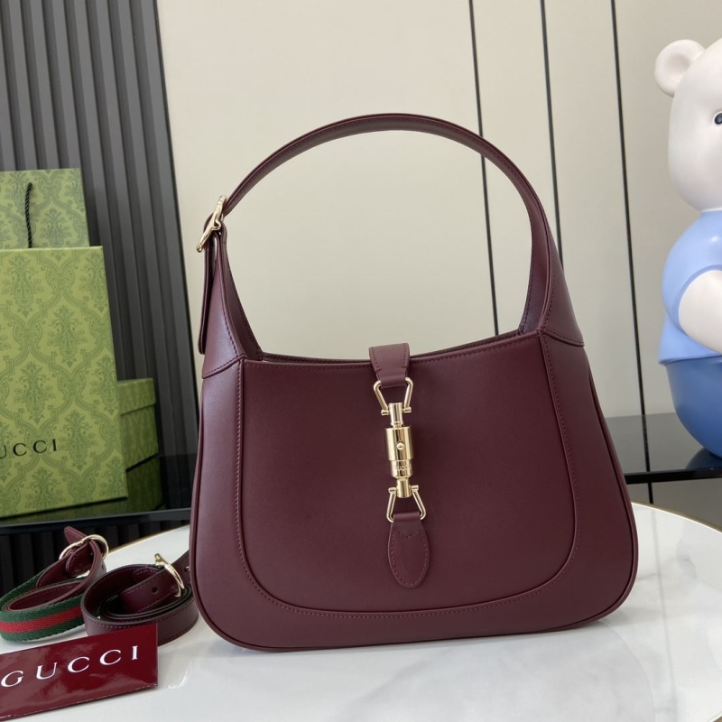 G*u*i top handle bags